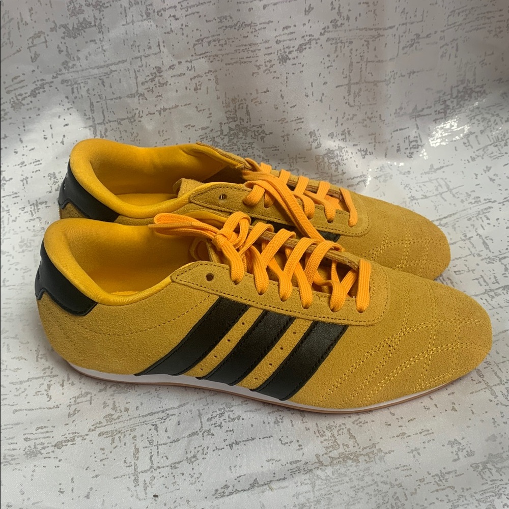 adidas Women's Yellow Suede Sneakers with Black Stripes